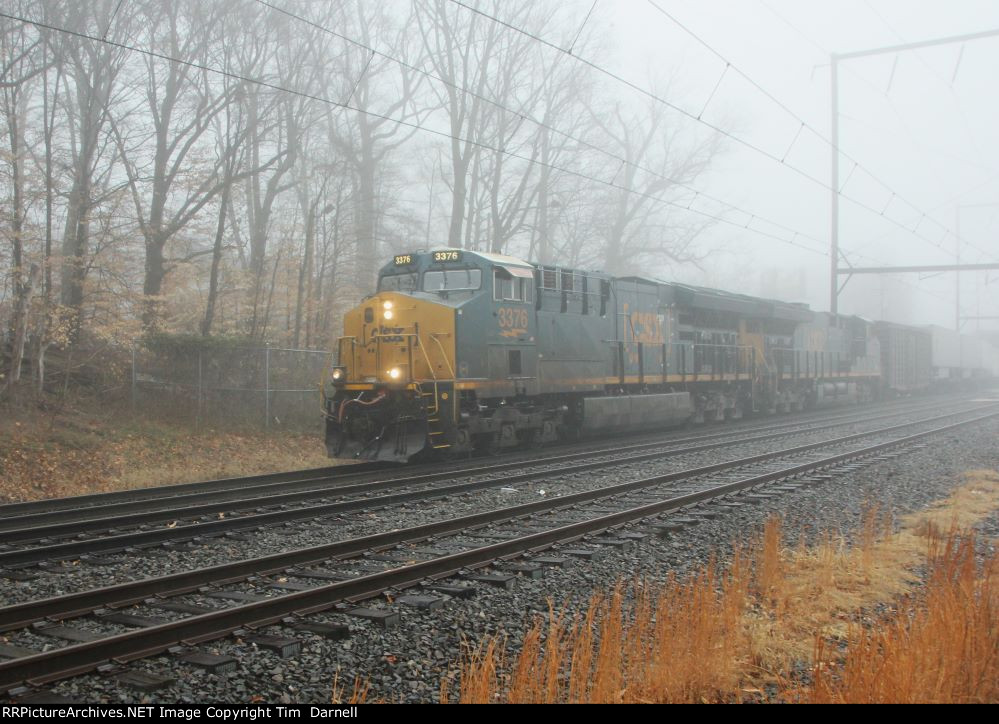 CSX 3376 heads east in the fog on X032